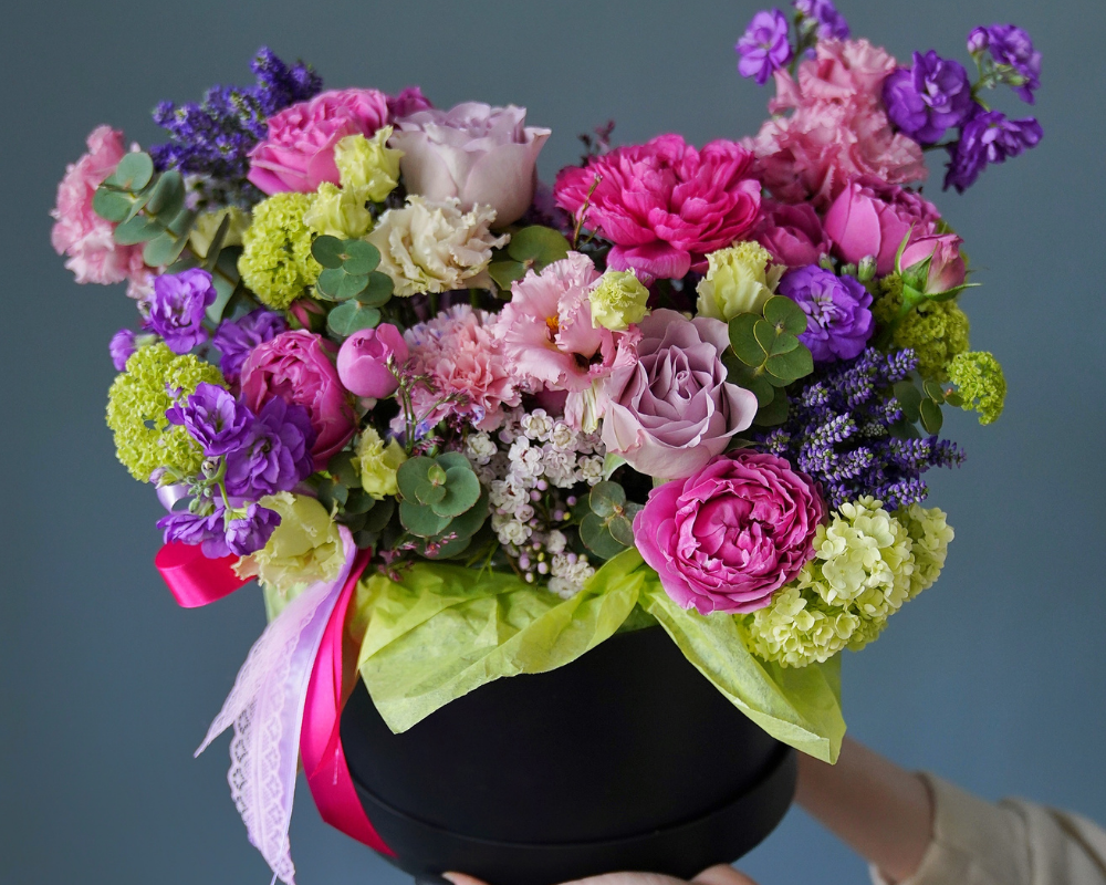 Wild flowers and roses on fine ceramic pot